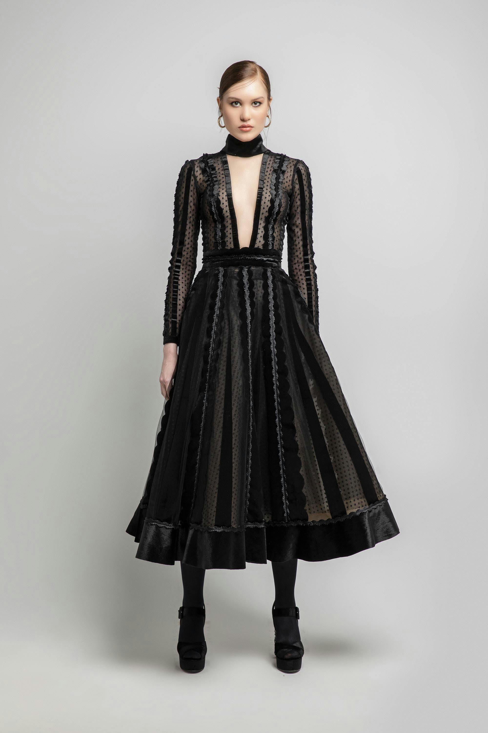 Look 14 - Jean Fares Couture-JFC- Long sleeve,halter deep V-necline , black transparent dress
